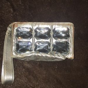 Original Stuart Weitzman mini wristlet.